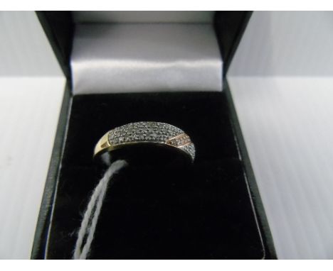 A 9ct Gold Diamond Pave-Set Band Ring.