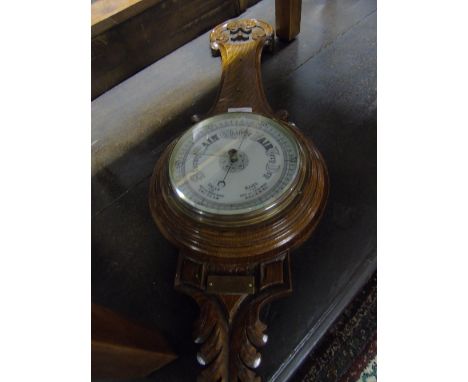 An Oak Aneroid Barometer/Thermometer