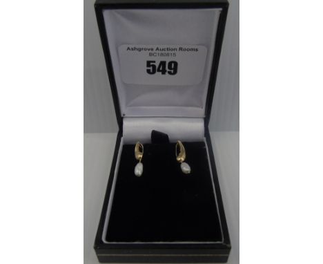 A pair of Nine Carat Pearl Drop Earrings.