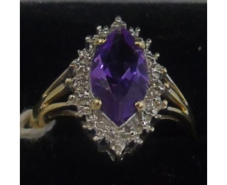 A 9ct Gold Amethyst & Diamond Cluster Ring.