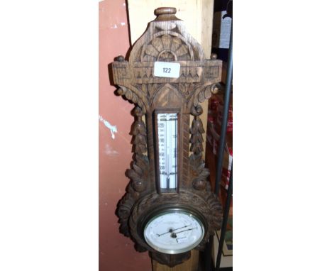 Early 20th Century Carved Oak Framed Aneroid Wheel Barometer.