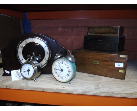 An Art Deco Bakelite 'Enfield' Mantel Clock, together with two further clocks and three 19th century boxes to include an oliv
