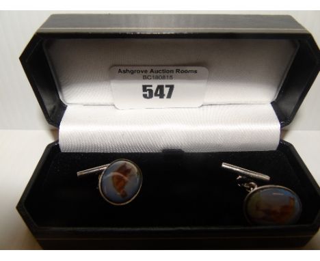 A Pair of Silver Enamel Cufflinks.
