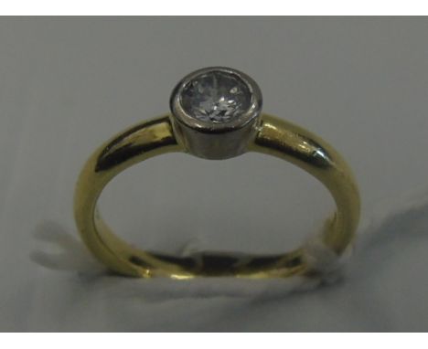 An Eighteen Carat Diamond Solitaire Ring, 