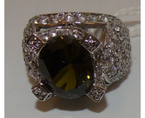A Silver Olivine Set Ring.