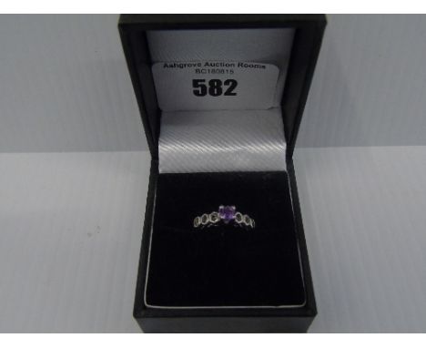 A Silver Gem Set Ring.