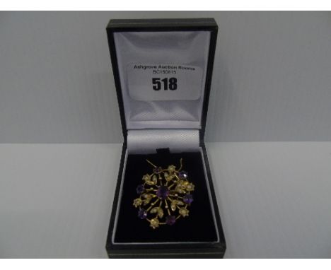 An Antique Gold Amethyst and Pearl Pendant on a Nine Carat Gold Chain.