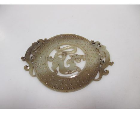 A Chinese jade bi  No damage. 14.5cm x 10.5cm