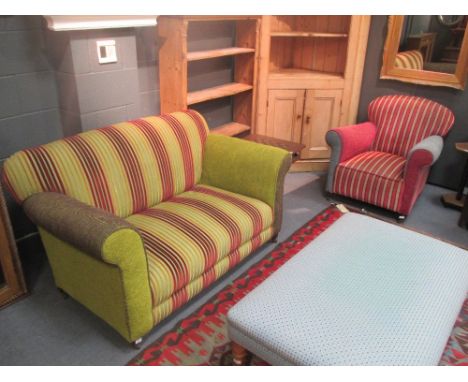 An upholstered armchair and matching sofa in striped fabric (2)  