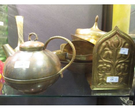 A collection of German and Austrian metalware including a bowl Attributed to Hagenhauer, a teapot with monogram and six other