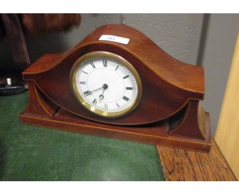 A mahogany mantel clock and an Art Deco chrome framed mirror (2)  