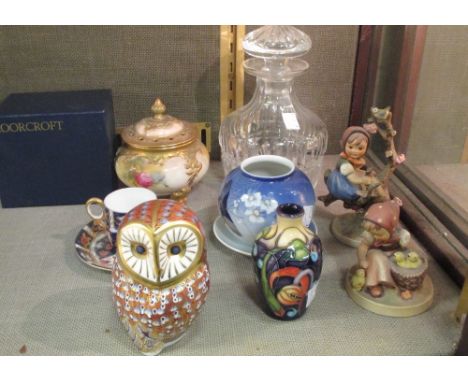 A Royal Crown Derby imari paperweight owl, an Imari coffee can and saucer, two Goebel Hummel figures, a Worcester Pot Pourri 