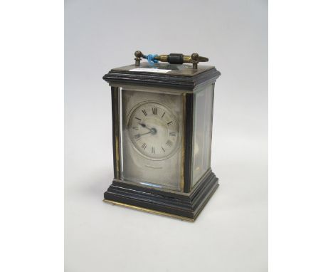 A brass cased carriage clock  
