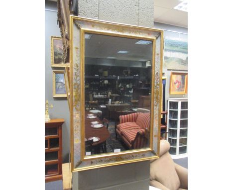 A modern verre eglomise mirror  