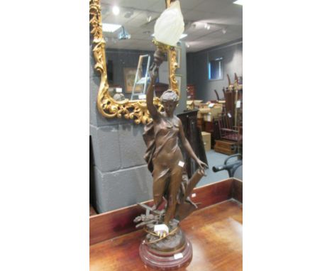 A bronzed spelter figural lamp entitled 'La Paix', mounted to a fluted mahogany column base  