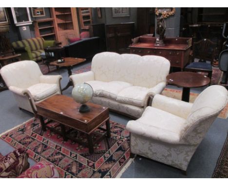 A 19th century walnut framed sofa and matching armchairs, upholstered in a silk damask fabric (3)  