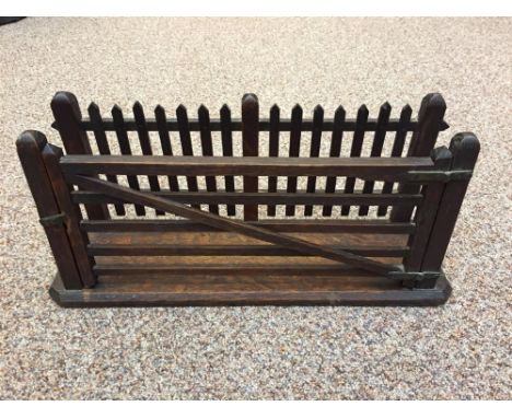 An early 20th century oak novelty letter rack, as a five-bar gate and picket fence 17 x 37cm (7 x 14in)  