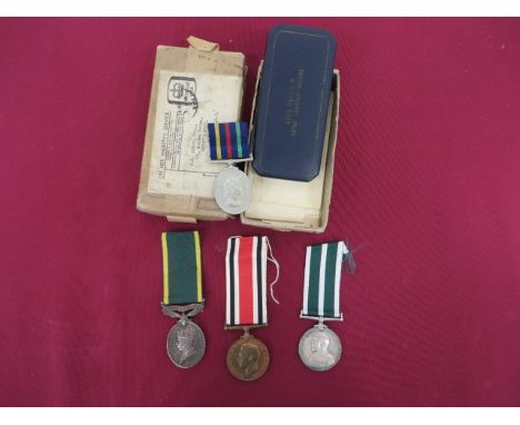 Royal Naval Reserve Long Service & Good Conduct Medal etc.  A George V example awarded to 'D.1915 A.L. DURRAND RNR' ... Accom