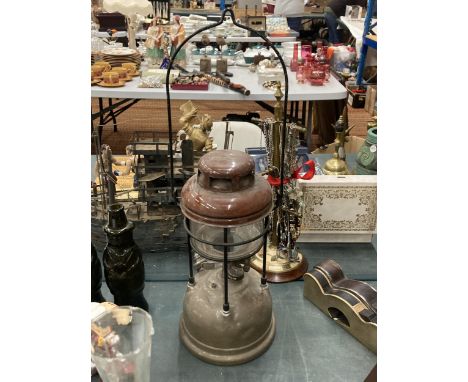 A VINTAGE TILLEY LAMP WITH BROWN ENAMEL TOP 