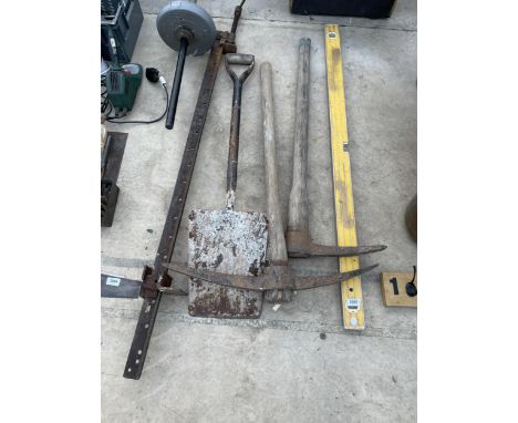 AN ASSORTMENT OF TOOLS TO INCLUDE TWO PICK AXES AND A SASH CLAMP ETC 