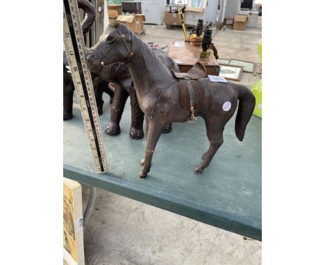 A VINTAGE MINIATURE LEATHER BOUND HORSE 