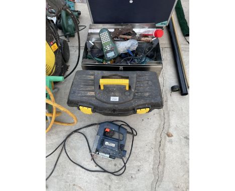 AN ASSORTMENT OF TOOLS TO INCLUDE A JIGSAW AND BATTERY SCREW DRIVER ETC 