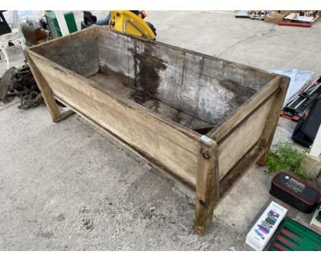 A LARGE VINTAGE WOODEN TROUGH PLANTER (L:183CM W:70CM) 