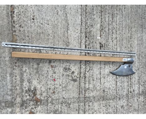 A DECORATIVE AXE WITH WOODEN HANDLE 
