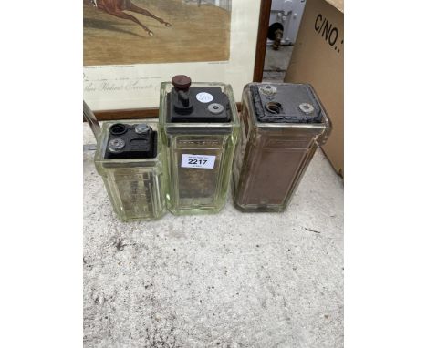 THREE VINTAGE GLASS CAR BATTERIES 