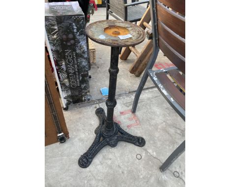 A VINTAGE CAST IRON PUB TABLE BASE 