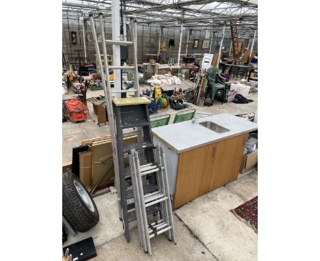 THREE VARIOUS LADDERS TO INCLUDE A WOODEN STEP LADDER ETC 