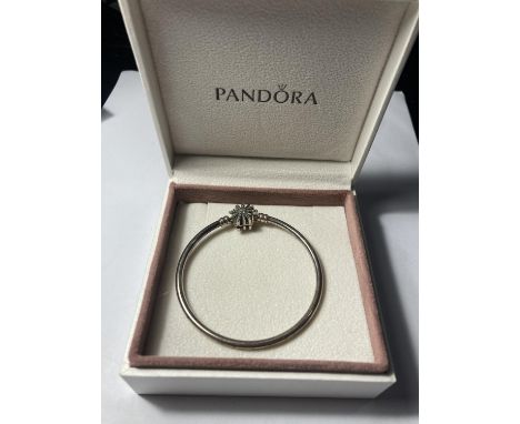 A PANDORA BANGLE IN A PRESENTATION BOX 