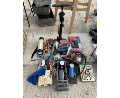 AN ASSORTMENT OF TOOLS TO INCLUDE TWO FOOT PUMPS, BRACE DRILL, TAPE MEASURES AND A CABLE DETECTOR ETC 