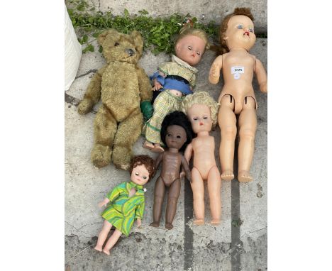 AN ASSORTMENT OF VINTAGE DOLLS AND TEDDIES 