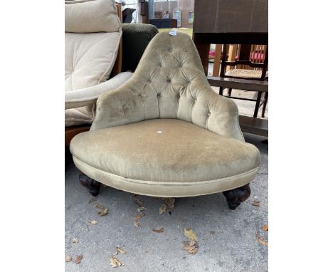 A VICTORIAN BUTTON-BACK CORNER CHAIR ON ROSEWOOD FRONT LEGS 