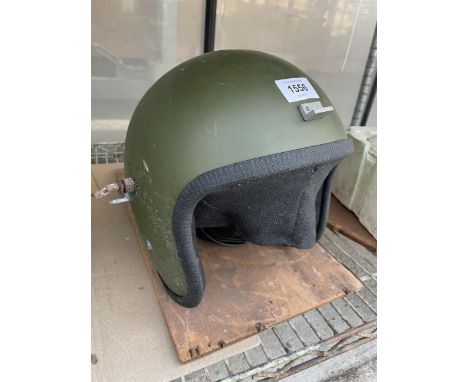 A VINTAGE MOTORCYCLE HELMET 