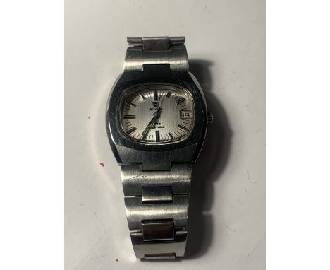 A VINTAGE NIVADA WRIST WATCH WITH ORIGINAL BRACELET. MANUAL SEEN WORKING BUT NO WARRANTY 
