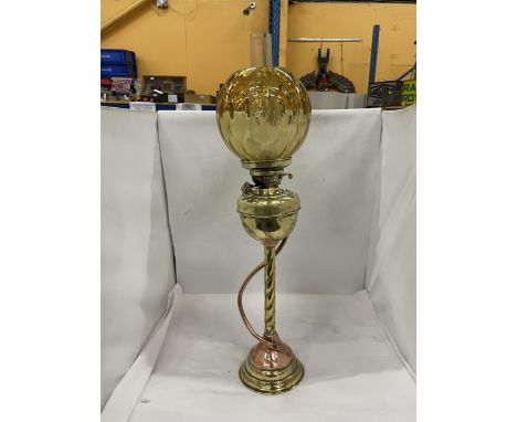 A VINTAGE OIL LAMP WITH MABER COLOURED GLASS SHADE, GLASS FUNNEL AND A BRASS AND COPPER TWISTED BASE 