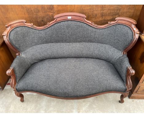 A 19TH CENTURY MAHOGANY SOFA WITH SCROLL ARMS AND BACK, ON FRONT CABRIOLE LEGS 