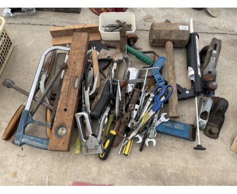 A LARGE ASSORTMENT OF HAND TOOLS TO INCLUDE SPANNERS, AN AXE AND WOOD PLANES ETC 
