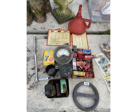 AN ASSORTMENT OF VINTAGE ITEMS TO INCLUDE SPARK PLUGS, A VOLT METER AND OIL CANS ETC 