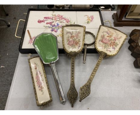 A GROUP OF EMBROIDERED DRESSING TABLE ITEMS AND TILE DESIGN TRAY 