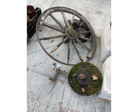 A VINTAGE CART WHEEL, A VINTAGE GRIND STONE AND A COBBLERS LAST ETC 