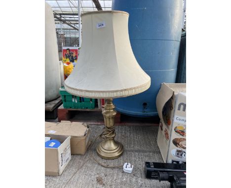 A DECORATIVE GILT TABLE LAMP WITH SHADE 