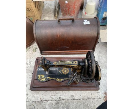 AN UNUSUAL AND VINTAGE SINGER SEWING MACHINE WITH WOODEN CARRY CASE 
