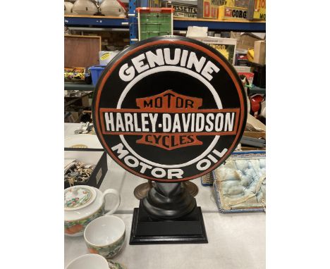 A LARGE CONVEX STEEL HARLEY DAVIDSON MOTOR OIL SIGN ON PEDESTAL, 21" HIGH 