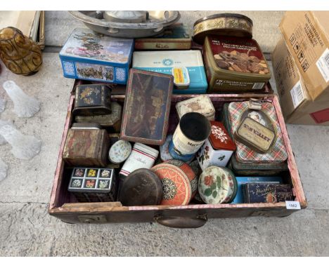 A LARGE ASSORTMENT OF VINTAGE TINS 