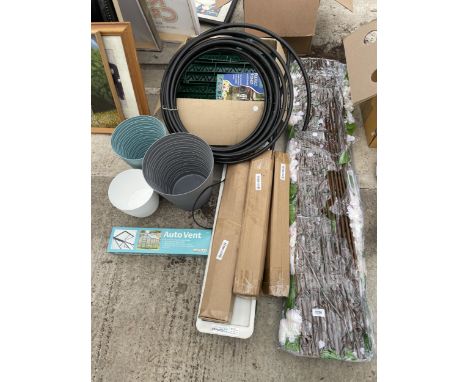 AN ASSORTMENT OF GARDEN ITEMS TO INCLUDE WICKER SCREENING, IRRIGATION PIPE AND PLANT POTS ETC 