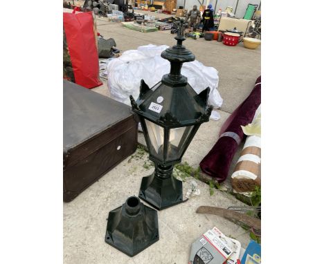 A DECORATIVE OUTSIDE POST TOPPER LIGHT FITTING 