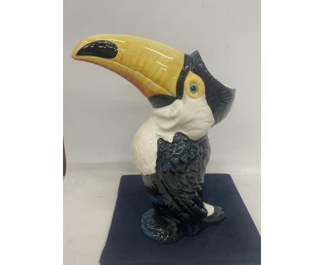 A DRAGONFLY JACK GRAHAM DESIGN TOUCAN FIGURE 
